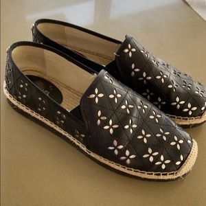 Michael Kors flats.